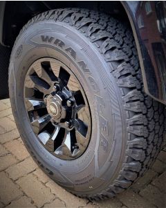 235/85R16 Goodyear Wrangler A/T Tyre Fitted and Balanced on 16x7in Sawtooth Style Alloy Wheel Black (Inc nuts and centre caps) (Writing on the Inside) - TYRE CURRENTLY OUT OF STOCK - NO DUE DATE 
